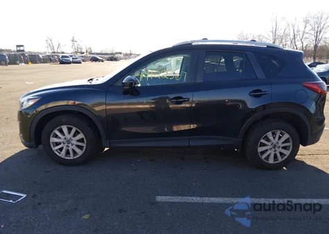 2013 Mazda Cx-5 Touring z USA, uszkodzony, nr VIN JM3KE2CE1D0145977